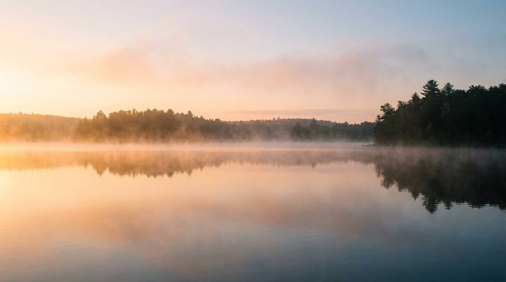 Peaceful lake at sunrise