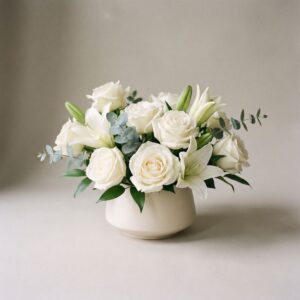 White sympathy flowers arrangement
